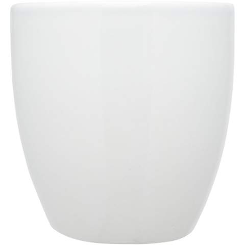 The Moni ceramic mug has a trendy glossy finish adding a sleek touch. It features a large handle that provides a comfortable and sturdy grip. The mug is versatile enough to use with both hot and cold beverages allowing you to enjoy coffee, tea, soup, and more.  Volume capacity is 430 ml. Dishwasher safe for all printing methods. Presented in a recycled cardboard gift box.