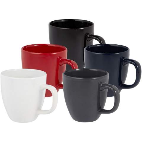 The Moni ceramic mug has a trendy glossy finish adding a sleek touch. It features a large handle that provides a comfortable and sturdy grip. The mug is versatile enough to use with both hot and cold beverages allowing you to enjoy coffee, tea, soup, and more.  Volume capacity is 430 ml. Dishwasher safe for all printing methods. Presented in a recycled cardboard gift box.
