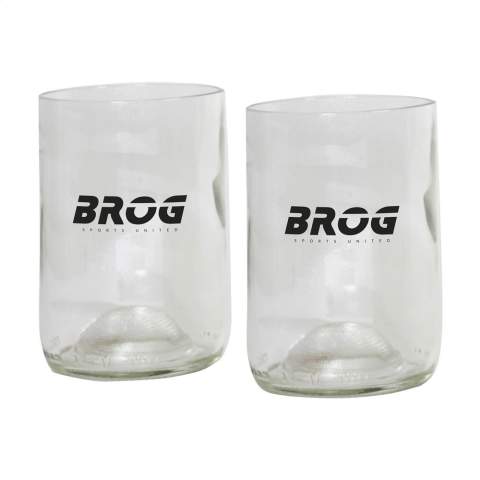 Set of Rebottled® design drinking glasses made from upcycled wine bottles. Unique glasses in which you immediately recognise the original wine bottle. The glasses fit comfortably in your hand and have a smooth finish. Of high quality and suitable for water, soft drinks or cocktails. Dishwasher-safe up to 60C°. Washing by hand is recommended to preserve the imprint. Per set delivered in an original gift box made from recycled FSC®-certified cardboard. Dutch design. Made in Holland. Capacity approx. 400 ml per glass. Imprint only possible in black or white.     Rebottled® upcycles empty wine bottles into 100% circular design items.