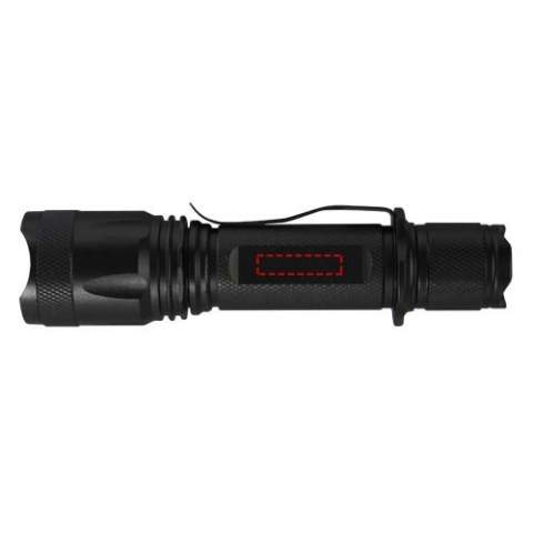 Never run out of battery with this rechargeable high power tactical aluminium flashlight. The solid black aluminium alloy casing offers a tactical look, with an impact resistance of 1 metre. The flashlight features a belt clip for easy carrying, and it is splash-proof with a IPX4 rating. The 5W LED generates 300 lumen for up to 3 hours, and has a beam distance of 200 meters with 5 different light modes: high, medium, low, strobe and SOS. The high power comes from a built-in lithium battery with a capacity of 2000mAh. The flashlight has a size of 14.5 x 3.4 cm and only weighs 170 gram. Comes with an instruction manual and is packed in a recycled cardboard gift box with a size of 17.5 x 6 x 4 cm. Laser engraving on the aluminium body is recommended.
