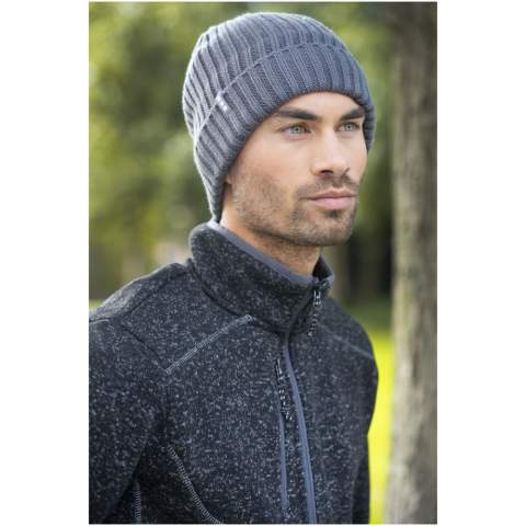 The Spire beanie – where style and comfort come together. Made from 100% acrylic in a classic 2x2 rib knit, this beanie ensures a snug fit and enduring quality. It has a timeless design, characterized by the  pattern of raised vertical lines. Embrace both warmth and fashion with the Spire beanie, the perfect accessory that offers stretchiness and flexibility for a comfortable, adaptable fit.