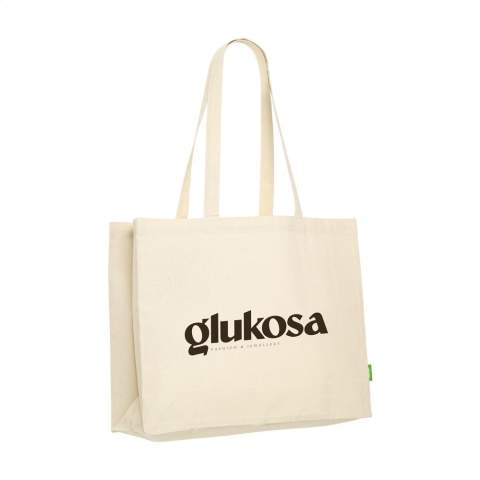 WoW! Sturdy shopping bag made from 100% organic quality cotton (180 g/m²). With long handles. This shopping bag is the perfect replacement for one-use plastic bags. GOTS-certified. Capacity approx. 19 litres.
