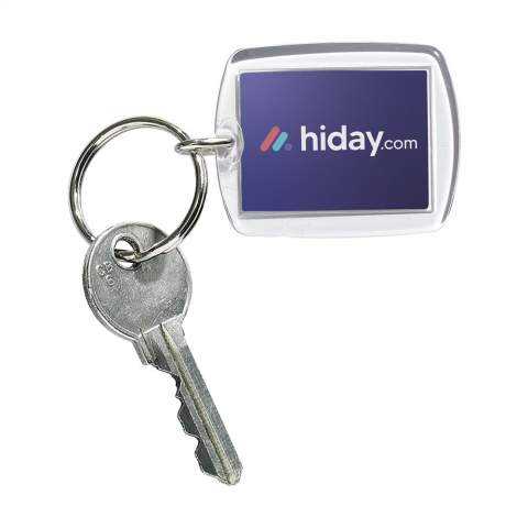 Keyring with clear plexiglass (acrylic).  • Without an imprint: Supplied without inlay and in loose parts. Transparant parts per 500 pieces in a plastic bag. Main holding with keyring per 500 pieces in a plastic bag. Plexiglass front plates per 500 pieces in a plastic bag. Even for smaller quantities, the parts are delivered sorted. • With an imprint: Supplied with inlay and assembled. Dim. inlay 4 x 3 cm.