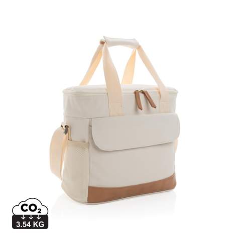Sac en toile composé de 60% coton recyclé et 40% polyester recyclé avec détails PU et doublure en PEVA. Avec 2 poches latérales en maille et 1 poche avant pour un rangement supplémentaire. Le traceur AWARE™ qui prouve l'utilisation authentique de la toile recyclée. Permet de stocker jusqu'à 20 canettes.  2% de chaque vente de produit Impact vendu sera versée en don à Water.org.<br /><br />PVC free: true