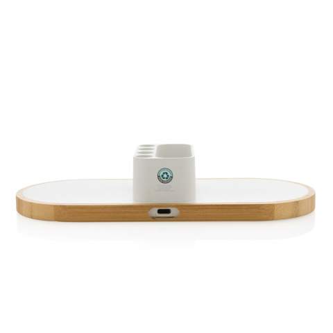 Dual 10W fast wireless charger with pen holder made with RCS (Recycled Claim Standard) certified recycled ABS. Total recycled content: 31% based on total item weight. RCS certification ensures a completely certified supply chain of the recycled materials. The base is made from  FSC®100% bamboo. Wireless charging compatible with Android latest generations, iPhone 8 and up. Can charge two phones at the same time or charge any other wireless device. With 4 pen holes for storing pens/pencils and small storage for business card or other small objects. Item and accessories PVC free. Including 120 cm type C charging cable made from RCS certified recycled TPE. Packed in  FSC®mix kraft box. Type-C in; Input 5V/2A; 9V/2A; Wireless output 5V/1A;9V/1.1A; (10W) Registered design®<br /><br />WirelessCharging: true<br />PVC free: true