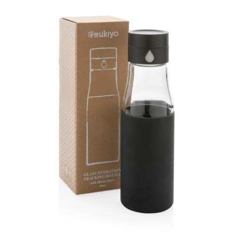 Track your daily hydration goals with this cleverly designed Ukiyo borosilicate glass 600ml water bottle. The lid displays a bigger water drop each time you refill and twist the collar so you can easily keep count of the number of bottles you drink. The body is dishwasher safe. Leakproof. Registered design®