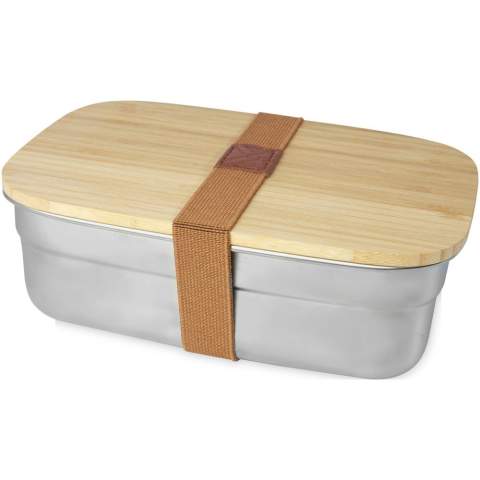 This stainless steel lunch box has a capacity of 700 ml, and a bamboo lid with a silicone sealing to keep the lunch box closed properly. Comes with an elastic band closure, keeping the lid securely in place for when on the go. The bamboo used is sourced and produced following sustainable standards. The container is dishwasher safe without the lid.