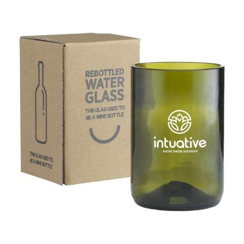 A design drinking glass made from an upcycled wine bottle. A unique glass by the Rebottled® brand, in which you immediately recognise the original wine bottle. The glass fits comfortably in your hand and has a smooth finish. Of high quality and suitable for water, soft drinks or cocktails. Dishwasher-safe up to 60C°. Washing by hand is recommended to preserve the imprint. Per piece delivered in an original gift box made from recycled FSC®-certified cardboard. Dutch design. Made in Holland. Capacity approx. 400 ml. Imprint only possible in black or white.     Rebottled® upcycles empty wine bottles into 100% circular design items.