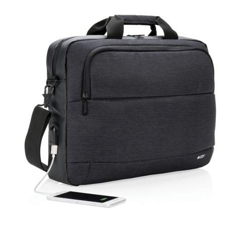 Fashionable 15” laptop bag in two tone polyester with PU. Designed with one large main compartment for your laptop and one front compartment. Connect your powerbank easily to the integrated USB charging port and charge your phone or tablet on the go. With shoulder strap and trolley strap on the back.<br /><br />FitsLaptopTabletSizeInches: 15.0<br />PVC free: true