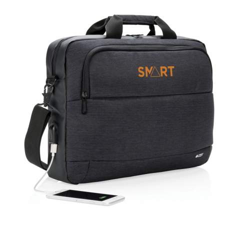Fashionable 15” laptop bag in two tone polyester with PU. Designed with one large main compartment for your laptop and one front compartment. Connect your powerbank easily to the integrated USB charging port and charge your phone or tablet on the go. With shoulder strap and trolley strap on the back.<br /><br />FitsLaptopTabletSizeInches: 15.0<br />PVC free: true