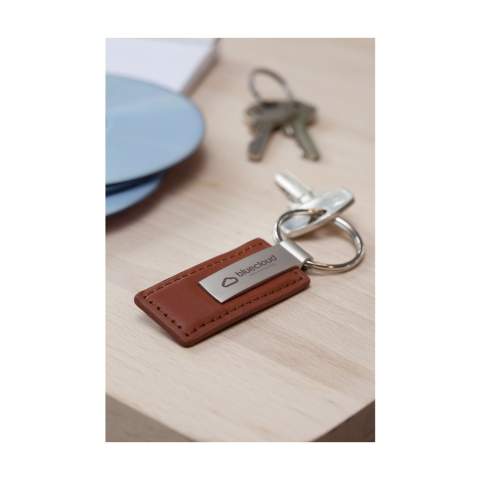 Sturdy keyring with a matte metal keychain and imitation leather tag. Each item is supplied in an individual brown cardboard envelope.