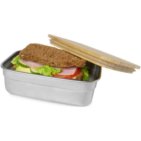 This stainless steel lunch box has a capacity of 700 ml, and a bamboo lid with a silicone sealing to keep the lunch box closed properly. Comes with an elastic band closure, keeping the lid securely in place for when on the go. The bamboo used is sourced and produced following sustainable standards. The container is dishwasher safe without the lid.