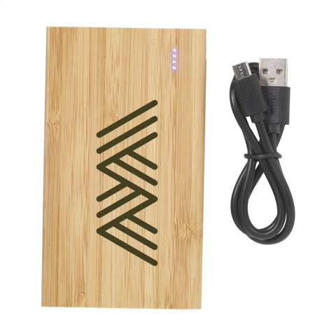 Compact, durable and environmentally responsible power bank made of natural FSC®100%-certified bamboo with built-in lithium polymer battery (4000mAh). Easily charges smartphones via the USB-port. Input 5V/2A (Type-C and micro-USB). Output: 5V/2A. With  indicator lights and on/off button. Includes charging cable with USB-C connection, USB-C connector and user manual. Each item is individually boxed.