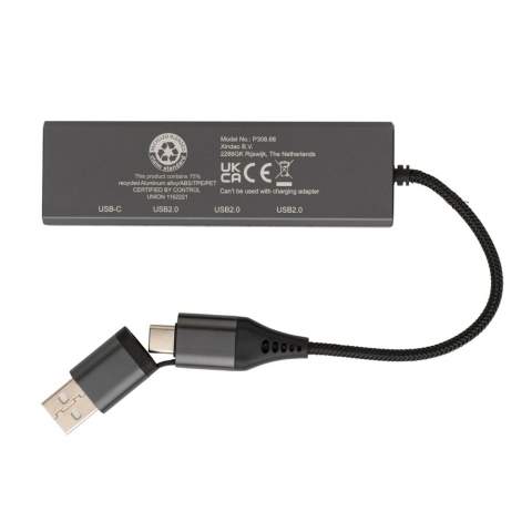 Aluminium USB-hub gemaakt met RCS (Recycled Claim Standard) gecertificeerd gerecycled aluminium, ABS, TPE en PET. Met 3 USB A 2.0 poorten en 1 type C poort. De HUB heeft een geïntegreerde kabel van 10 cm gemaakt van gerecycled RCS-gecertificeerd TPE/PET-materiaal. Totaal gerecycled materiaal: 75% op basis van het totale gewicht van het item. RCS-certificering zorgt voor een volledig gecertificeerde toeleveringsketen van de gerecyclede materialen. Met dual input connector dus geschikt voor zowel type C als USB A computers. Aluminium verliest zijn eigenschappen niet in het recyclingproces en kan eindeloos worden gerecycled. Artikel en accessoires 100% PVC-vrij. Verpakt in FSC mix verpakking.<br /><br />PVC free: true