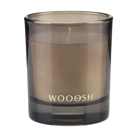 Decorative Wooosh scented candle poured into a beautifully polished glass jar supplied with a cork lid. This candle creates a pleasant scent and a peaceful atmosphere. The scented candle is made from wax, 5% of which is eco-friendly soy wax, and 5% fragrance oil. As soon as you light the candle you will experience a summery ambiance, the sun's warmth and the shade's freshness. The fruity scent of figs produced by this candle is sweet and slightly woody. This luxurious scented candle is ideal for any environment and has no less than 32 burning hours.  When you light the candle for the first time, let the top layer of wax melt completely. This ensures an even burn and the best possible fragrance experience. The perfect gift for any occasion. Each item is supplied in a luxurious Wooosh gift box.