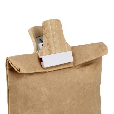 This bamboo clip is a practical and eco-friendly solution for home or office organization. The sturdy clip features a built-in magnet, perfect for attaching notes, photos, or reminders to your fridge or any metal surface. Ideal for sealing snack bags or organizing paperwork with a natural touch.