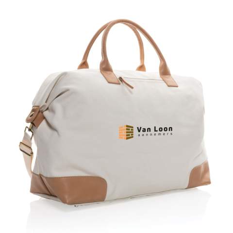 Plan your perfect getaway with this large 16oz. recycled canvas weekend bag. The bag features one big roomy compartment with front pocket and PU handles. The bottom features four brass studs to keep your bag clean when placed on the floor. 2% of proceeds of each Impact product sold will be donated to Water.org. Composition 60% recycled cotton and 40% recycled polyester. Lining in 150D recycled polyester.<br /><br />PVC free: true