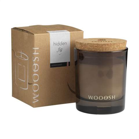 Decorative Wooosh scented candle poured into a beautifully polished glass jar supplied with a cork lid. This candle creates a pleasant scent and a peaceful atmosphere. The scented candle is made from wax, 5% of which is eco-friendly soy wax, and 5% fragrance oil. As soon as you light the candle you will experience a summery ambiance, the sun's warmth and the shade's freshness. The fruity scent of figs produced by this candle is sweet and slightly woody. This luxurious scented candle is ideal for any environment and has no less than 32 burning hours.  When you light the candle for the first time, let the top layer of wax melt completely. This ensures an even burn and the best possible fragrance experience. The perfect gift for any occasion. Each item is supplied in a luxurious Wooosh gift box.