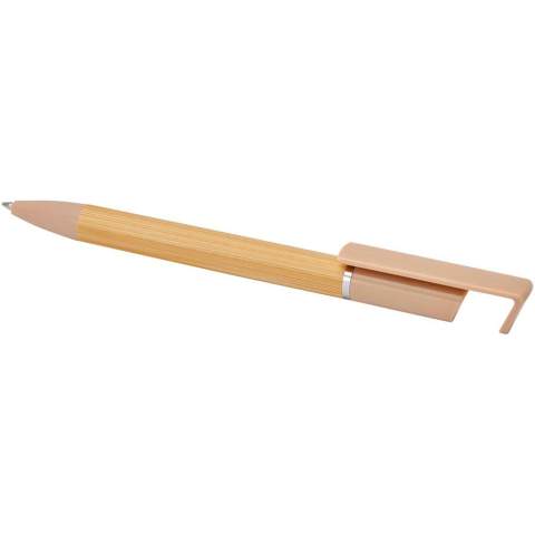 Bamboo-Kugelschreiber, der auch als Telefonhalterung fungiert. Der Knopf und der Mittelring bestehen aus recyceltem Kunststoff, die Spitze aus Messing und der Schaft aus nachhaltig angebautem Bambus. Tintenfarbe: Schwarz. Schreiblänge: 1000 Meter. Strichstärke: 1,0 mm.