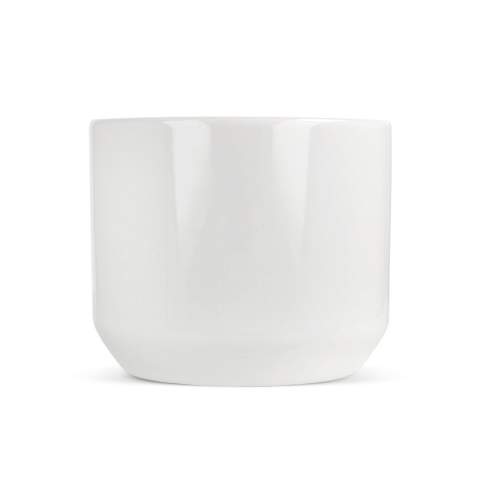 White mug made from porcelain. Clean style with a compact handle.