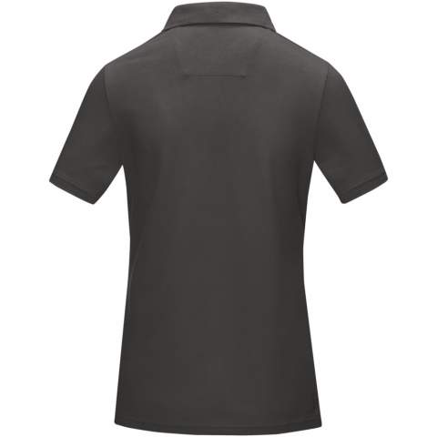 The Graphite short sleeve women's GOTS organic polo is a testament to both style and sustainability. Crafted from GOTS certified 180 g/m² soft and comfortable organic cotton, this polo combines ethical manufacturing with exceptional comfort. This polo is designed with a fitted shape for a feminine look. Adding to its sustainability, the polo features GRS certified buttons, further reducing its environmental impact. With its timeless design the Graphie polo effortlessly elevates your style for any occasion. GOTS certification ensures a 100% certified supply chain from raw material to our printing techniques, making this garment an eco-friendly choice. Choose sustainability without compromising on style with the Graphite polo.
