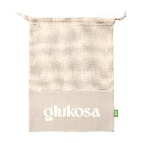 WoW! Reusable fruit and vegetable bag made from 100% organic cotton (120 g/m²). Mesh cotton on the front and plain cotton on the back with a handy drawstring closure. Using this bag helps to reduce the number of one-use plastic bags in circulation. GOTS-certified. Capacity approx. 1.5 litres