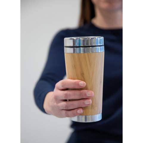 This unique tumbler comes with 304 foodgrade and rustproof stainless steel interior walls and organic bamboo exterior. Keep your drinks hot for up to 3h and cold for up to 6h. Perfect fit for in the car. Content: 450 ml.<br /><br />HoursHot: 3<br />HoursCold: 6