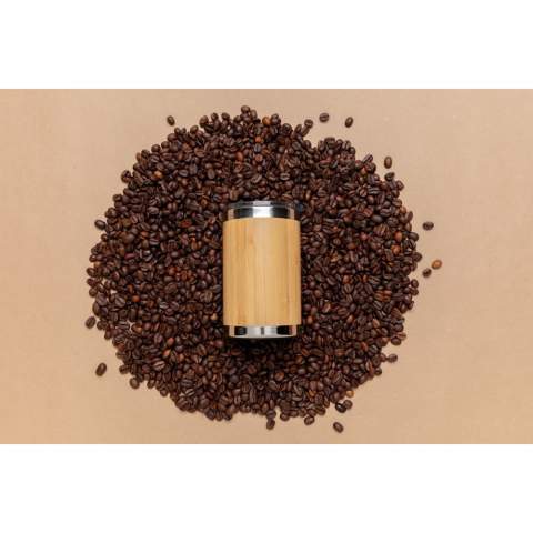 This unique bamboo coffee tumbler comes with 304 foodgrade and rustproof stainless steel interior walls and organic bamboo exterior. Perfect size to fit most coffee machines. Keep your drinks hot for up to 3h and cold for up to 6h. Content: 270 ml.<br /><br />HoursHot: 3<br />HoursCold: 6