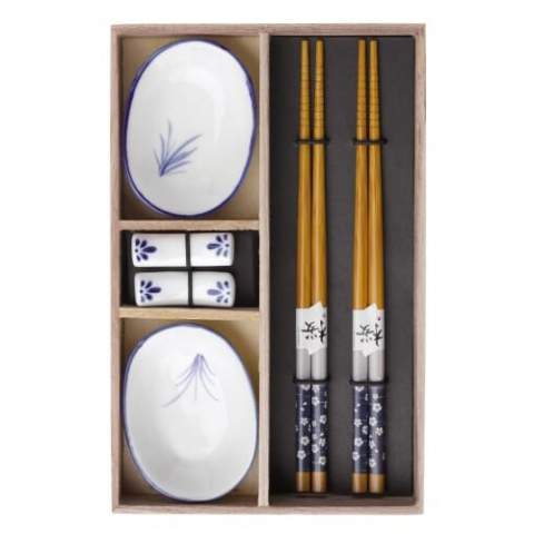 Two-person sushi serving set with chopsticks, chopstick holders and bowls for soya sauce.