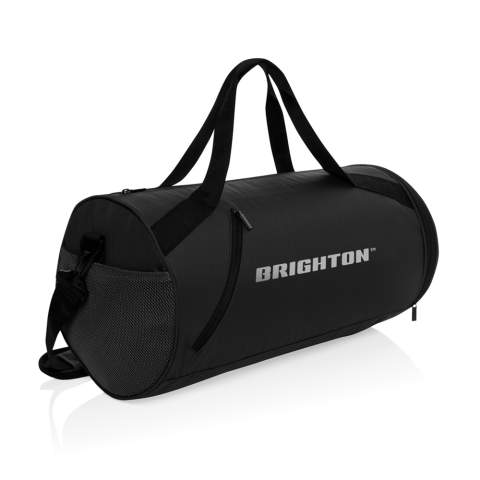 Stay organized and stylish with the Aware™ RPET True Sports Bag. Made from 100% rPET, this durable and functional bag features an adjustable shoulder strap (140cm), two webbing handles with a button closure, and multiple compartments for easy storage. The front zipper pocket, shoe zipper compartment (Up to size EU size 46.5 fit) on the side, and spacious main zipper compartment ensure you can carry everything you need, whether it's for the gym, weekend trips, or daily activities; Made with recycled polyester embedded with the AWARE™ tracer. 2% of proceeds of each product sold with AWARE™ will be donated to Water.org. PVC free.<br /><br />PVC free: true
