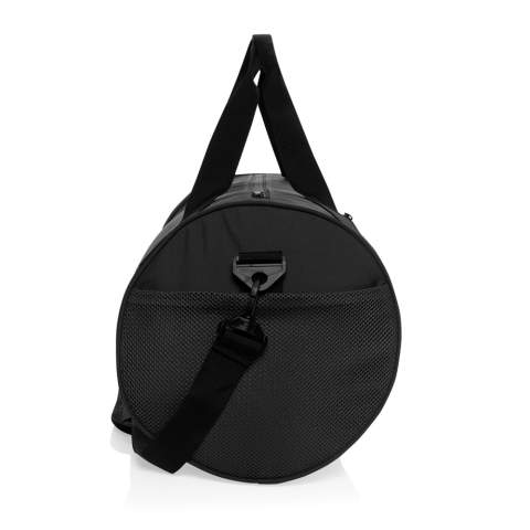 Stay organized and stylish with the Aware™ RPET True Sports Bag. Made from 100% rPET, this durable and functional bag features an adjustable shoulder strap (140cm), two webbing handles with a button closure, and multiple compartments for easy storage. The front zipper pocket, shoe zipper compartment (Up to size EU size 46.5 fit) on the side, and spacious main zipper compartment ensure you can carry everything you need, whether it's for the gym, weekend trips, or daily activities; Made with recycled polyester embedded with the AWARE™ tracer. 2% of proceeds of each product sold with AWARE™ will be donated to Water.org. PVC free.<br /><br />PVC free: true