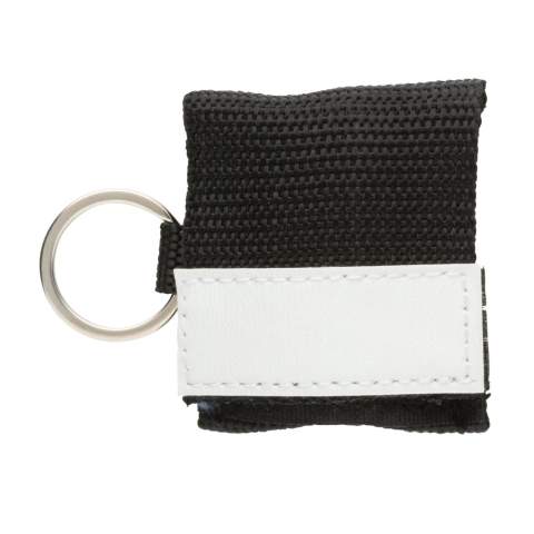 Small CPR face shield for mouth to mouth resuscitation, in webbing style pouch with velcro closure and steel keyring. Conform EN 13485:2016. With non-return valve.