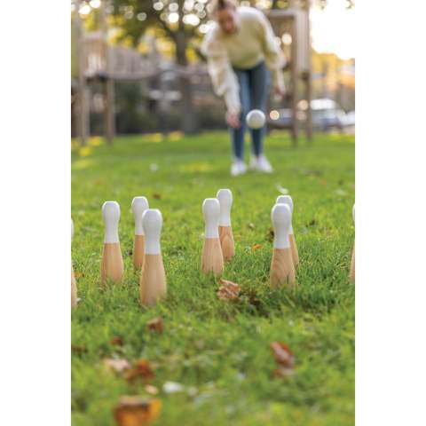 Get ready to aim with this beautiful crafted skittles set made from pine wood. Skittles is fun for both adults and children. Play at home with family, in a park or challenge the guest of your party. Easy set up- just set up the pins, set a throwing point and you are ready to go. The set includes 9 pins and three balls. Presented in a cotton pouch with rule book.