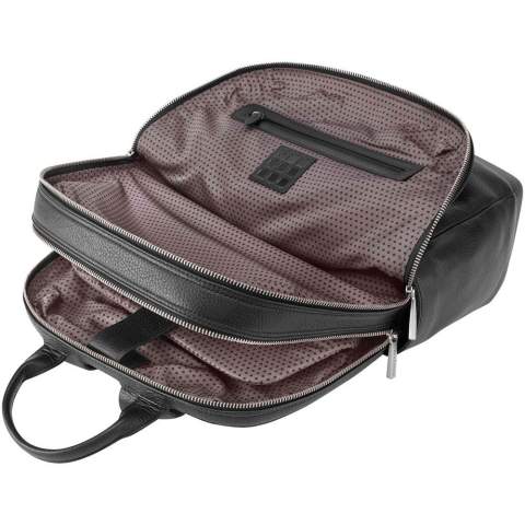 The Classic Leather Pro Backpack is an elegant professional companion with plenty of space to organize your professional and creative tools. Created to mirror the essential design of the Classic Notebook, this hardworking premium leather backpack is built to store everything you need to boost productivity and empower creative thinking. Fits devices up to 15" and features a double zip closure to separate your laptop from your personal belongings, breathable air-mesh back for cool comfort on the move, adjustable backpack straps, debossed monogram, secure zip pocket on front, durable YKK zippers with Moleskine logo, my Moleskine notes pocket to store ideas, 1 organizer with 2 pen holders and business card holder, zip pocket for precious items. Size: 43 x 33 x 14cm. Volume 13,5L.