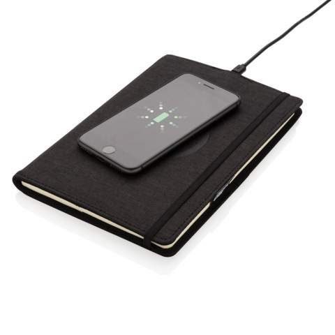 The Air 5W wireless charging refillable notebook cover allows you to charge your smartphone without the cables. Simply put the phone on top and start charging! It comes with a 80cm micro USB cable so you can easily connect your cover to any power source. The cover is made from polyester and has an elastic closure. The notebook inside has a black soft PU cover and had 80 sheets/160 lined pages cream coloured 70 grams paper. Input:5V/2A - Wireless output:5V/1A. Registered design®<br /><br />NotebookFormat: A5<br />WirelessCharging: true<br />NumberOfPages: 128<br />PaperRulingLayout: Lined pages
