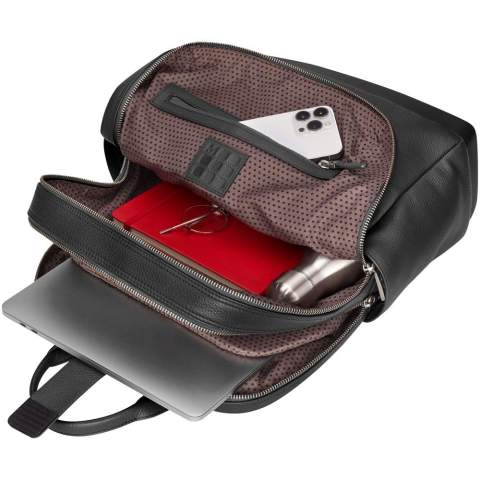 The Classic Leather Pro Backpack is an elegant professional companion with plenty of space to organize your professional and creative tools. Created to mirror the essential design of the Classic Notebook, this hardworking premium leather backpack is built to store everything you need to boost productivity and empower creative thinking. Fits devices up to 15" and features a double zip closure to separate your laptop from your personal belongings, breathable air-mesh back for cool comfort on the move, adjustable backpack straps, debossed monogram, secure zip pocket on front, durable YKK zippers with Moleskine logo, my Moleskine notes pocket to store ideas, 1 organizer with 2 pen holders and business card holder, zip pocket for precious items. Size: 43 x 33 x 14cm. Volume 13,5L.