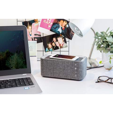 The Vogue 6W wireless charging speaker combines two essential functions of modern life: listening to your favourite music and charging your mobile device without any wires. The trendy fabric design is perfect for your desk, at home or on the go. The speaker uses wireless BT 3.0 for smooth connection and has an operating distance up to 10 metres. With handsfree function and pick up. The 4.000 mAh battery allows you to play music for up to 10 hours or charge your mobile phone twice (depending on the size of your phone’s battery) In case your phone doesn’t support wireless charging you can also use the USB port on the back to charge your phone in the traditional way with a cable.  When using both functions it is recommended to keep the item connected to a power source via the included 150 cm micro USB cable. Input: 5V/1A. Output: 5V/1A. Wireless output: 5V/1A 5W. Registered design®<br /><br />HasBluetooth: True<br />WirelessCharging: true<br />NumberOfSpeakers: 1<br />SpeakerOutputW: 6.00
