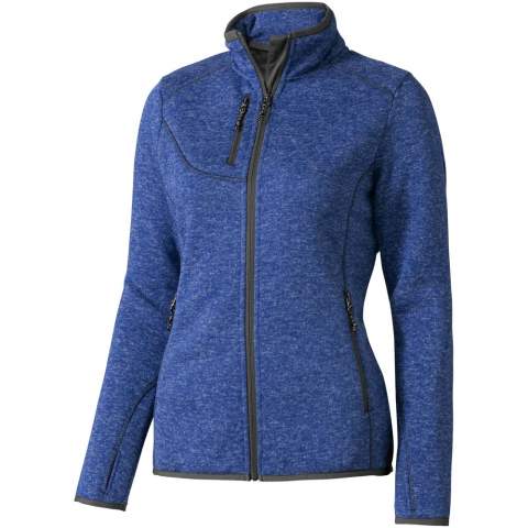 The Tremblant women's knit jacket – a perfect blend of style and functionality. This jacket looks like a cosy sweater with a contrast reversed coil zipper for functionality. The jacket's chest pocket with zipper closure provides a secure space for your essentials. The thumb holes keep the garment in place and also provides extra comfort and warmth. The contrast-coloured flatlock stitching details adds to the appeal of the design. Made from 305 g/m² brushed back polyester sweater knit, this jacket ensures both a cozy feel and durability. This jacket is designed with a fitted shape for a feminine look. 