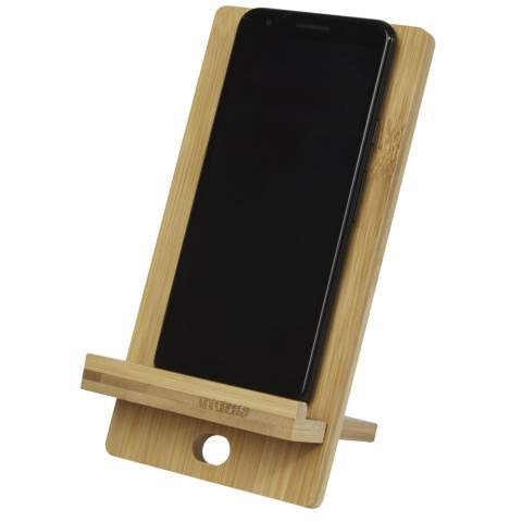 Versatile mobile phone holder made from bamboo that fits almost all phone models. Due to the clever construction the phone can be positioned in both portrait and landscape mode. Extra features are cooling vents on the back panel and a charging cable that easily can be hidden, not to interfer with the usage. Ideal phone accessory to place on the office desk, to watch a movie, or to use in the kitchen to read a recipe while cooking. The bamboo used is from sustainable, environmentally and socially responsible sources. Phone holder size: 9 x 9.5 x 18.5 cm. Comes with an instruction manual and is packed in a recycled cardboard gift box with a size of 21 x 11 x 2 cm.