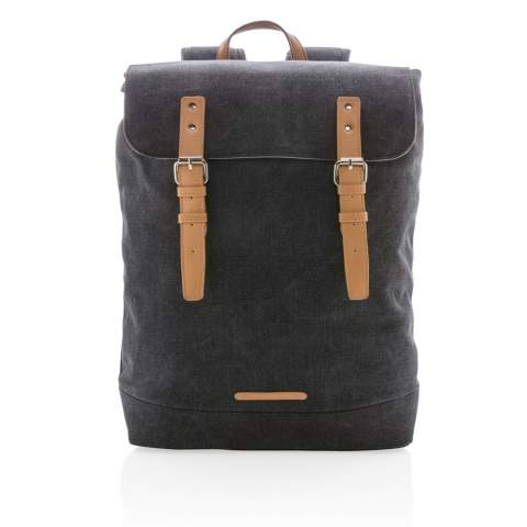 Carry your essentials for casual travel in this durable canvas backpack. This model features a padded section for your laptop up to 15.6". The top flap closes with two imitation leather magnetic buckles. PVC free.<br /><br />FitsLaptopTabletSizeInches: 15.6<br />PVC free: true
