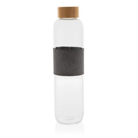 No more buying plastic water bottles from the shops but reuse your own durable bottle from the Impact Collection. By using durable glass and stainless steel materials you improve the re-usability of products compared to single use products. With the focus on water, 2% of proceeds of each sold Impact product will be donated to Water.org. Supporting your sustainable lifestyle, the Impact glass bottle with bamboo lid reduces your plastic waste and improves your hydration habits. Made of borosilicate premium-quality glass, resistant to big thermal changes. A beautiful sleeve completes the look. Capacity 750ML. BPA free.