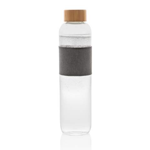 No more buying plastic water bottles from the shops but reuse your own durable bottle from the Impact Collection. By using durable glass and stainless steel materials you improve the re-usability of products compared to single use products. With the focus on water, 2% of proceeds of each sold Impact product will be donated to Water.org. Supporting your sustainable lifestyle, the Impact glass bottle with bamboo lid reduces your plastic waste and improves your hydration habits. Made of borosilicate premium-quality glass, resistant to big thermal changes. A beautiful sleeve completes the look. Capacity 750ML. BPA free.