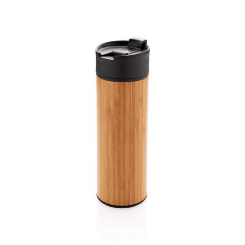 This perfect everyday mug is strong enough for hiking and sleek enough for in the office. The bamboo gives a timeless look and comfortable grip. With 1 handed drinking and lockable leakproof lid.  304 stainless steel outside wall and 201 stainless steel inside. Keep your drinks hot for up to 5h and cold for up to 15h with this vacuum insulated mug. Content: 450 ml. Registered design®<br /><br />HoursHot: 5<br />HoursCold: 15