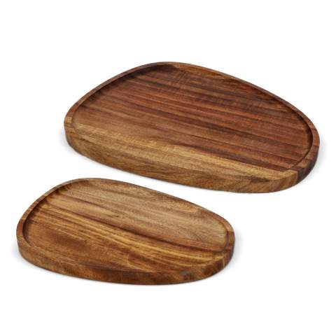 Bring warmth and style to your table with this beautiful InSideOuts set of two Acacia wooden trays. With their unique organic shape, they add a playful and natural touch to any occasion. Whether you are serving your favorite cheeses, olives, tapas, or even a cup of coffee or tea with a delicious cookie or pastry, these trays are the perfect choice.
Thanks to the sustainable and high-quality Acacia wood, the bowls radiate luxury and simplicity, while remaining easy to maintain. They are compact, beautiful to look at, and suitable for everyday use or a special moment.
Use them your way – for a cozy breakfast, a stylish drink, or a little moment for yourself. These trays are more than just functional, they make every presentation just that little bit more special.
