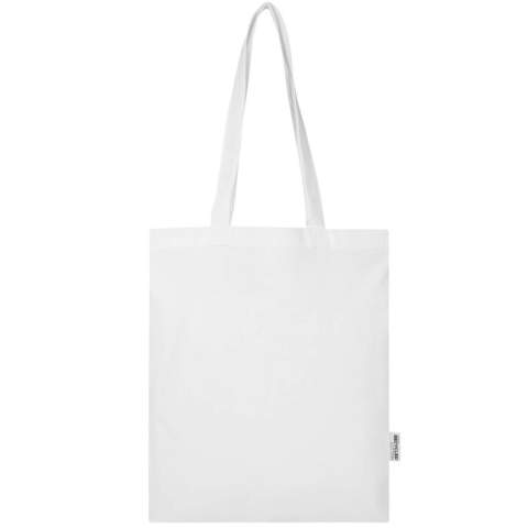 Le sac shopping Madras Blend, fabriqué à partir de 60 % de coton recyclé certifié GRS et de 40 % de RPET certifié GRS, est le sac idéal pour offrir à l’occasion d’un événement ou d’une conférence. Il peut également être utilisé comme sac à provisions pour les petits achats. La densité de coton de 140 g/m² de coton rend le sac robuste, durable et adapté pour transporter des articles lourds dans le compartiment principal. Avec ses poignées d'épaule de 30 cm de long, ce sac shopping est facile à transporter. Les méthodes d'impression disponibles pour ce sac shopping sont également certifiées GRS, ce qui garantit que l'ensemble de la chaîne d'approvisionnement est transparente et certifiée. Fabriqué en Inde. Capacité de charge maximale de 5 kg. Capacité : 7 litres.