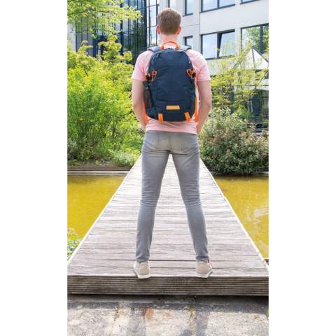 This large, versatile two-tone polyester backpack has a spacious main compartment for all your accessories. It is a fantastic pack for work, school or running errands. It will do a good job of protecting your laptop up to 15.6". Comes with reflective front protection, 2 mesh side pockets, sternum strap and rfid sleeved pockets inside. Comfort back padding system and mesh shoulder straps. PVC free.<br /><br />FitsLaptopTabletSizeInches: 15.6<br />PVC free: true