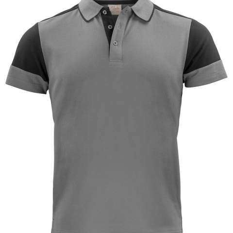 Bicolor polo piqué met drieknoopsluiting en contrasterende tipping aan de kraag. Contrasterend lint in de nek en aan de zijsplitjes. Uitscheurbaar neklabel en afzonderlijk geweven maatlabel. Aan de binnenzijde van de linkerzijnaad werd een zakje voorzien voor het innaaien van een waschip. Damesversie met korter knopenpad zonder knopen. Oeko-Tex* 100 gecertificeerd. Dit artikel is verpakt in een composteerbare polybag.