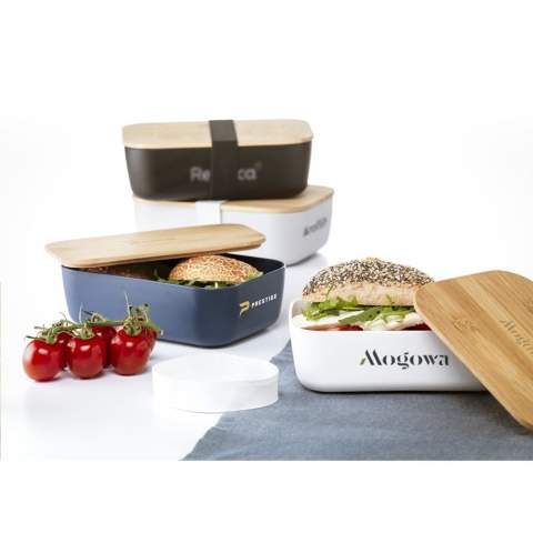 Generously sized lunch box made from PP plastic.  It has a bamboo lid that closes perfectly thanks to the silicone edge on the bottom. An elastic strap ensures that the lid stays in place on the go. Not dishwasher-safe.     NOTE: Due to the natural grains and contours of bamboo, we cannot guarantee consistency in depth/colour of the engraving.