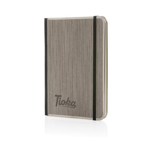 Het Treeline A5 notitieboek is een uitgekiende keuze voor het noteren van al je aantekeningen. Het notitieboekje is voorzien van een metalen bies, elastische band en een luxe FSC® houten kaft. Binnenin vind je 80 vellen (160 pagina's) met 80 gsm gelinieerd wit papier. Verpakt in FSC® mix krafthoes. Dit notitieboekje is een stijlvolle keuze voor al uw schrijfbehoeften.<br /><br />NotebookFormat: A5<br />NumberOfPages: 160<br />PaperRulingLayout: Gelinieerde pagina's
