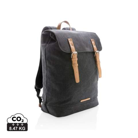 Carry your essentials for casual travel in this durable canvas backpack. This model features a padded section for your laptop up to 15.6". The top flap closes with two imitation leather magnetic buckles. PVC free.<br /><br />FitsLaptopTabletSizeInches: 15.6<br />PVC free: true